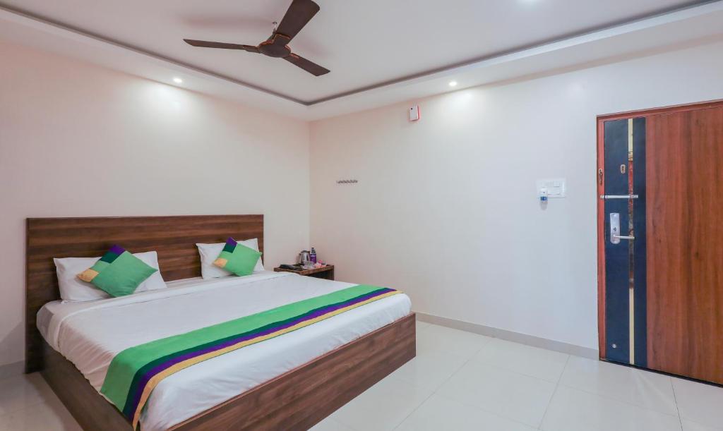Postel nebo postele na pokoji v ubytování Itsy Hotels Elite Inn