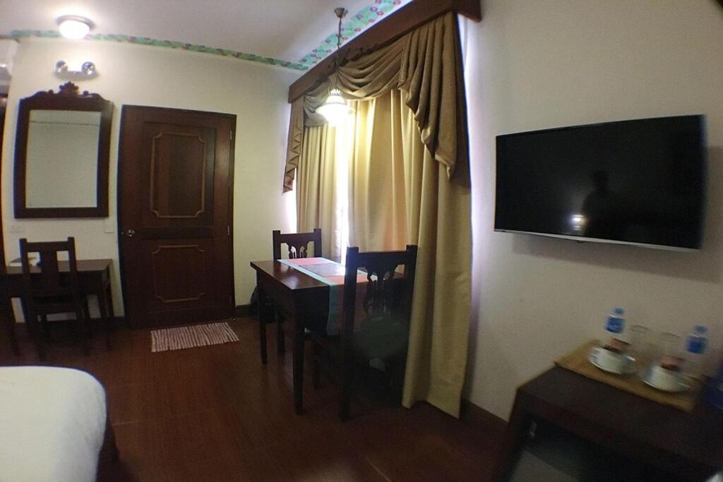 TV a/nebo společenská místnost v ubytování NSCC Hotel Vigan