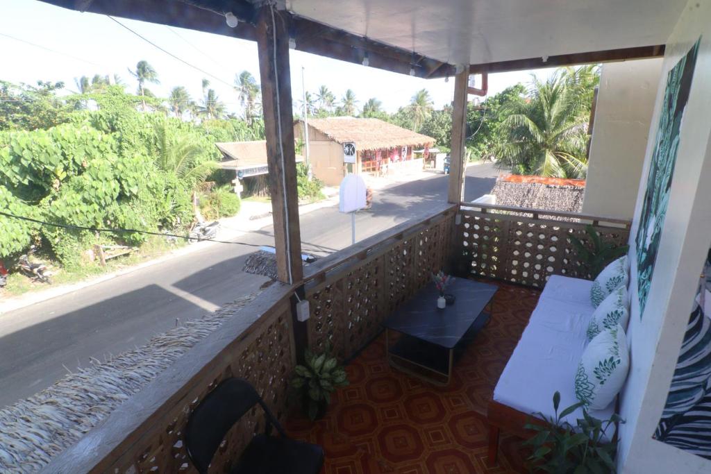 Balkón nebo terasa v ubytování Aloha Hostel Siargao