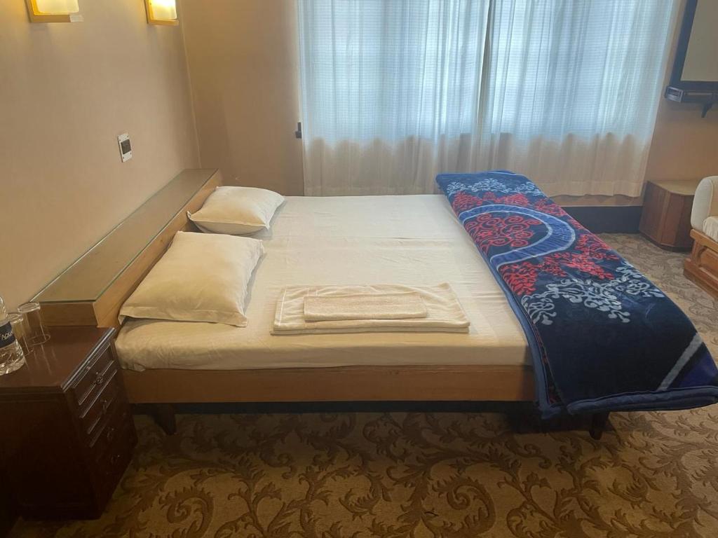 Postel nebo postele na pokoji v ubytování SETHI's HOMESTAY
