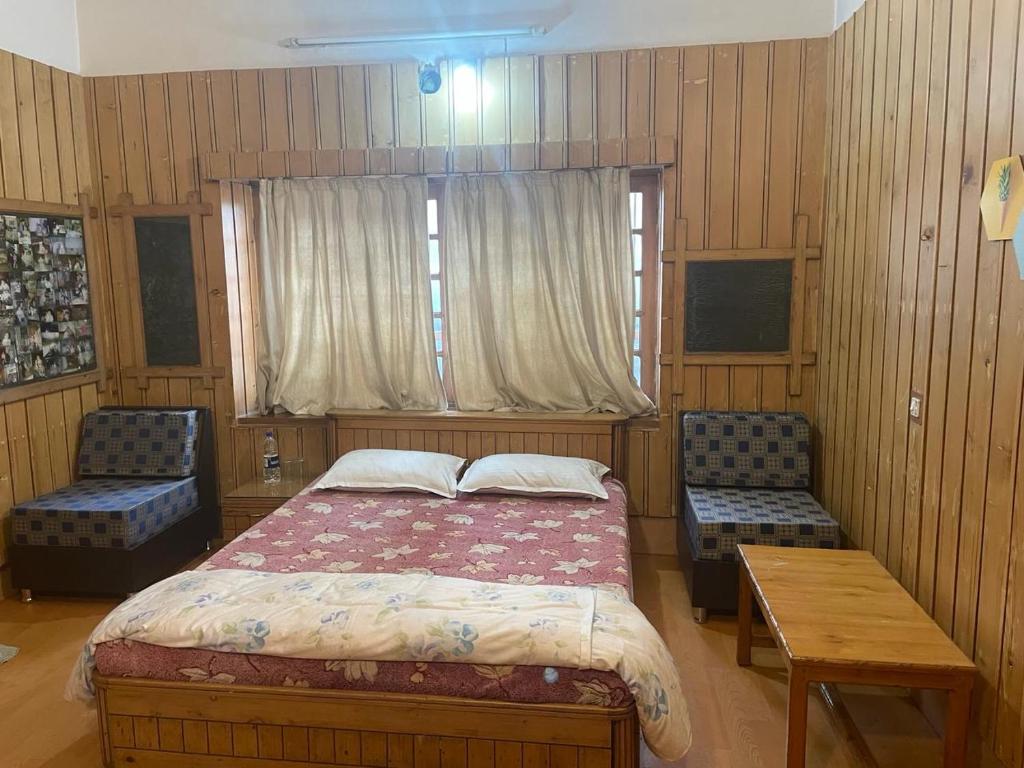 Postel nebo postele na pokoji v ubytování SETHI's HOMESTAY