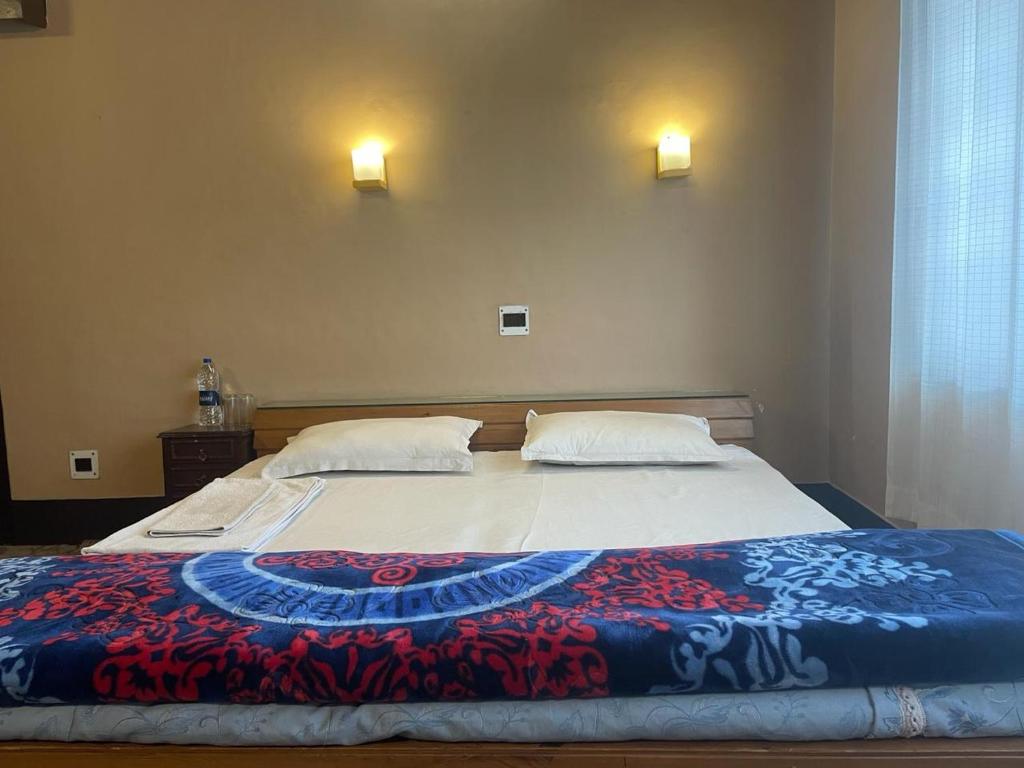 Postel nebo postele na pokoji v ubytování SETHI's HOMESTAY