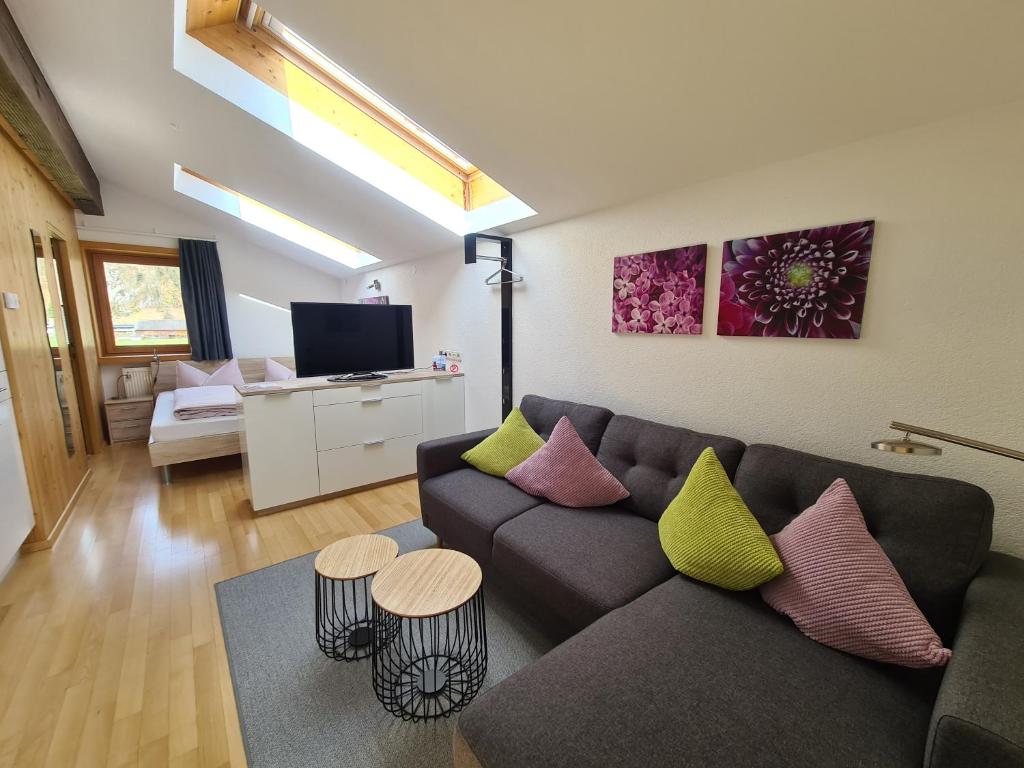 Televízia a/alebo spoločenská miestnosť v ubytovaní Ferienwohnung Greber Gertraud