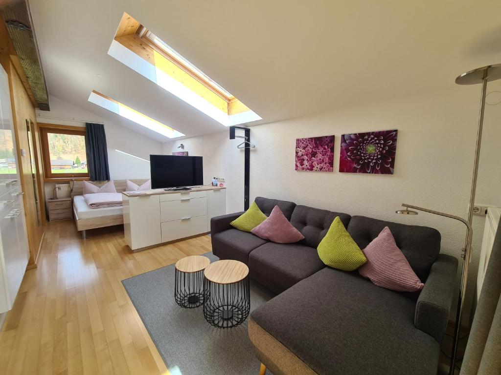 Televízia a/alebo spoločenská miestnosť v ubytovaní Ferienwohnung Greber Gertraud