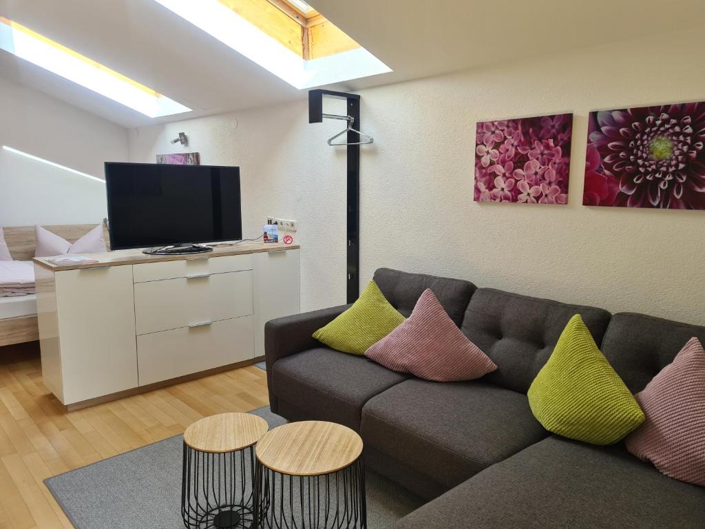 Televízia a/alebo spoločenská miestnosť v ubytovaní Ferienwohnung Greber Gertraud