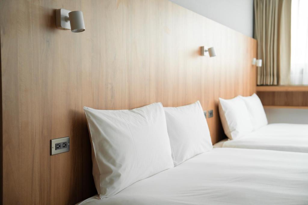 Postel nebo postele na pokoji v ubytování Norden Ruder Hostel Taitung Branch 2