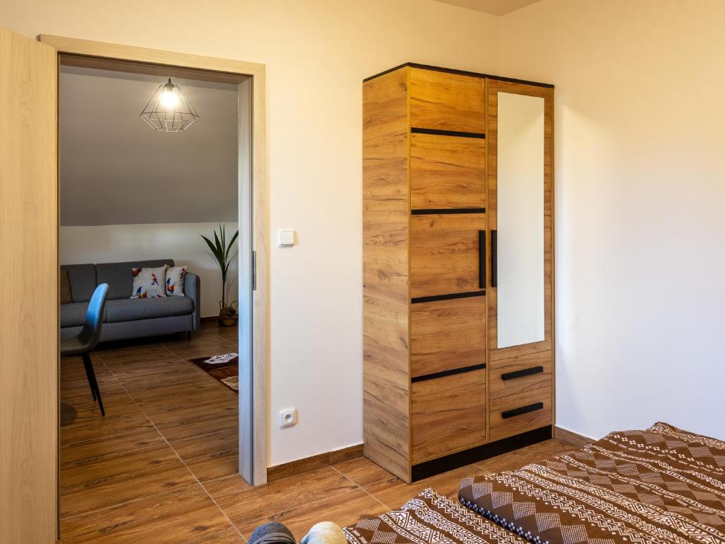 Postel nebo postele na pokoji v ubytování Penzion Krumlovské rozcestí
