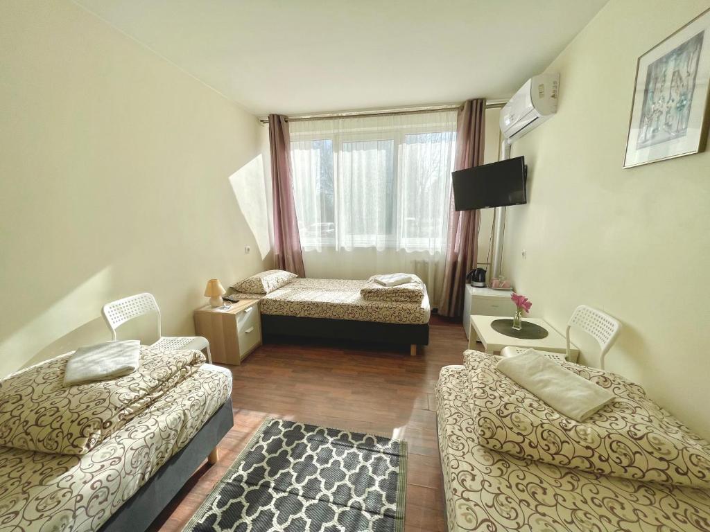 Postel nebo postele na pokoji v ubytování Savan House "Easy Kaunas"