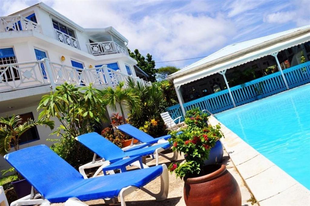 La alberca dentro o cerca de Hotel Cap Sud Caraibes
