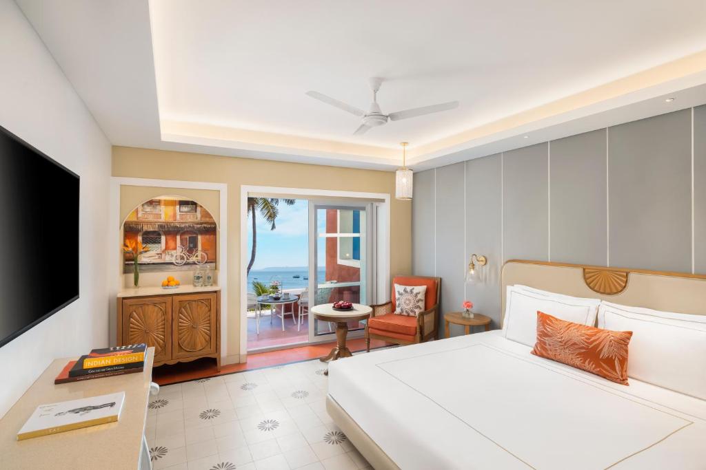 Postel nebo postele na pokoji v ubytování Taj Cidade de Goa Heritage, Goa