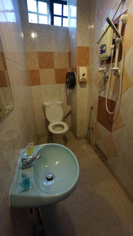 Koupelna v ubytování Zen Zeng Hotel