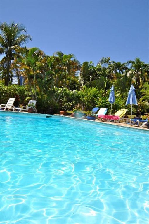 La alberca dentro o cerca de Hotel Cap Sud Caraibes
