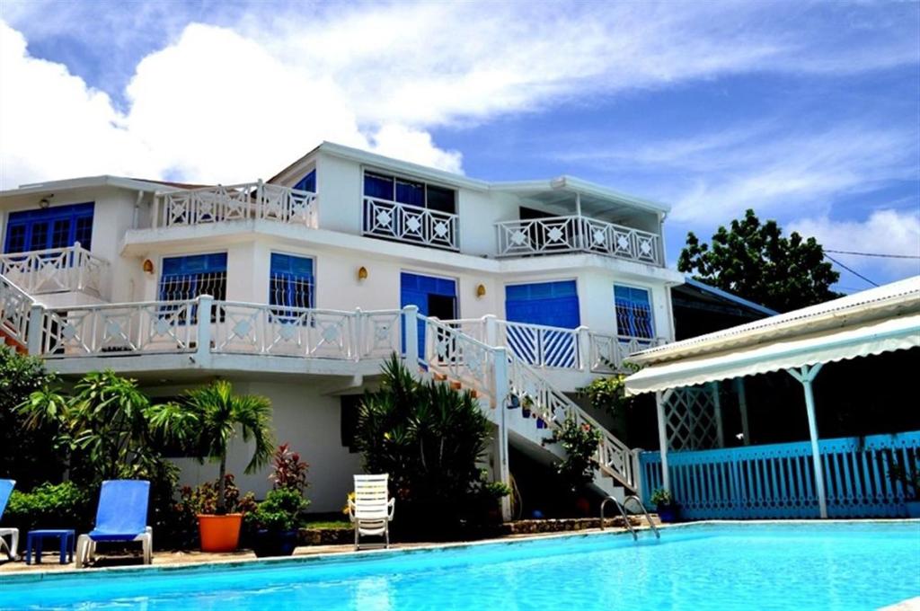 La alberca dentro o cerca de Hotel Cap Sud Caraibes