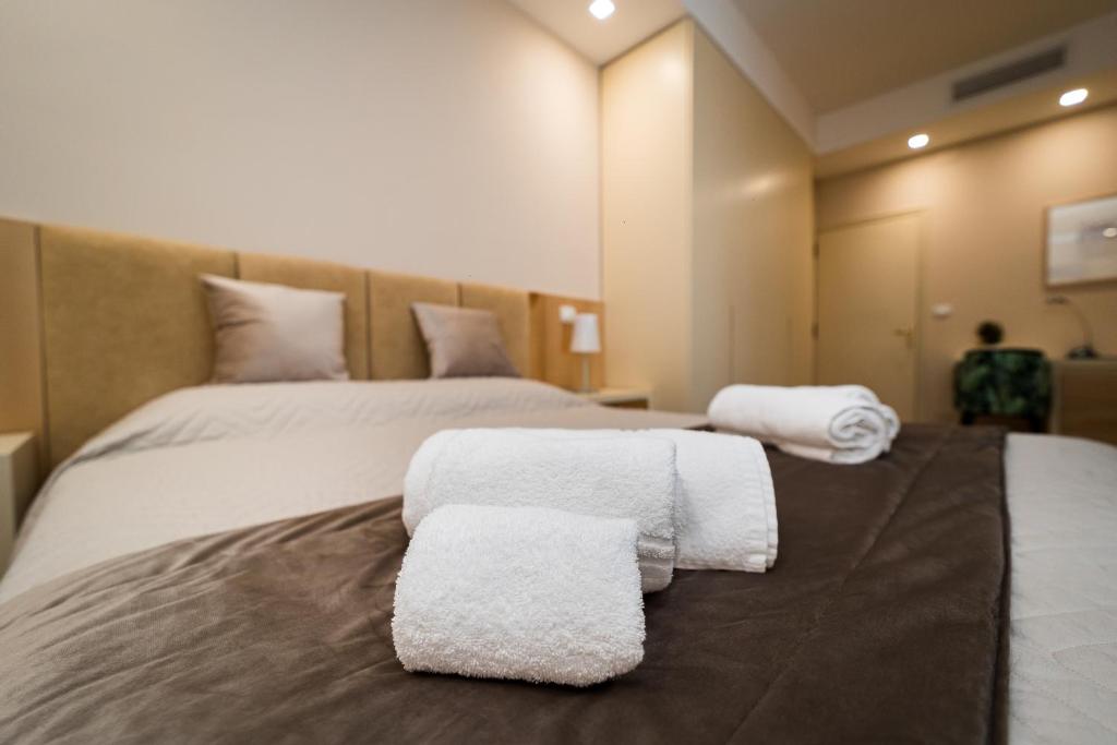 Postel nebo postele na pokoji v ubytování GoodStay Cianci Luxury Room