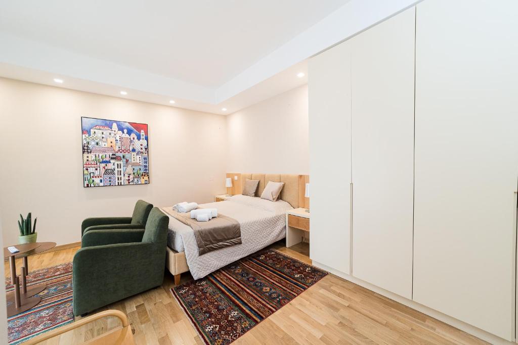 Postel nebo postele na pokoji v ubytování GoodStay Cianci Luxury Room