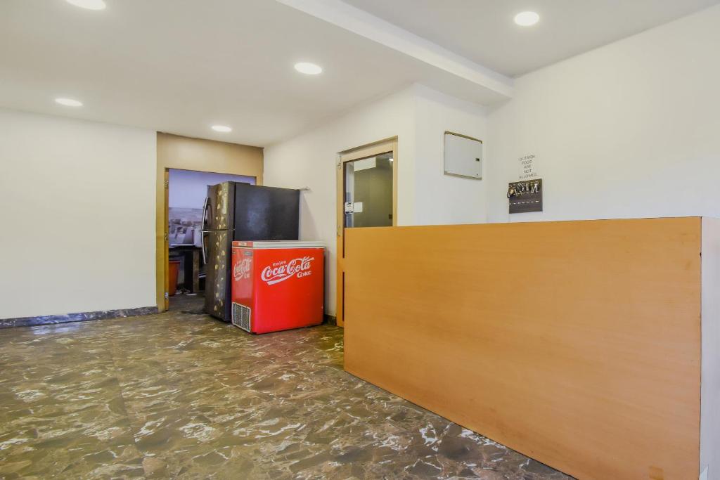 The lobby or reception area at Super OYO Krishna Guest House