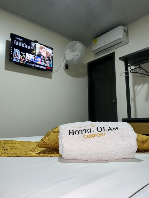 Postel nebo postele na pokoji v ubytování Hotel Olam Confort
