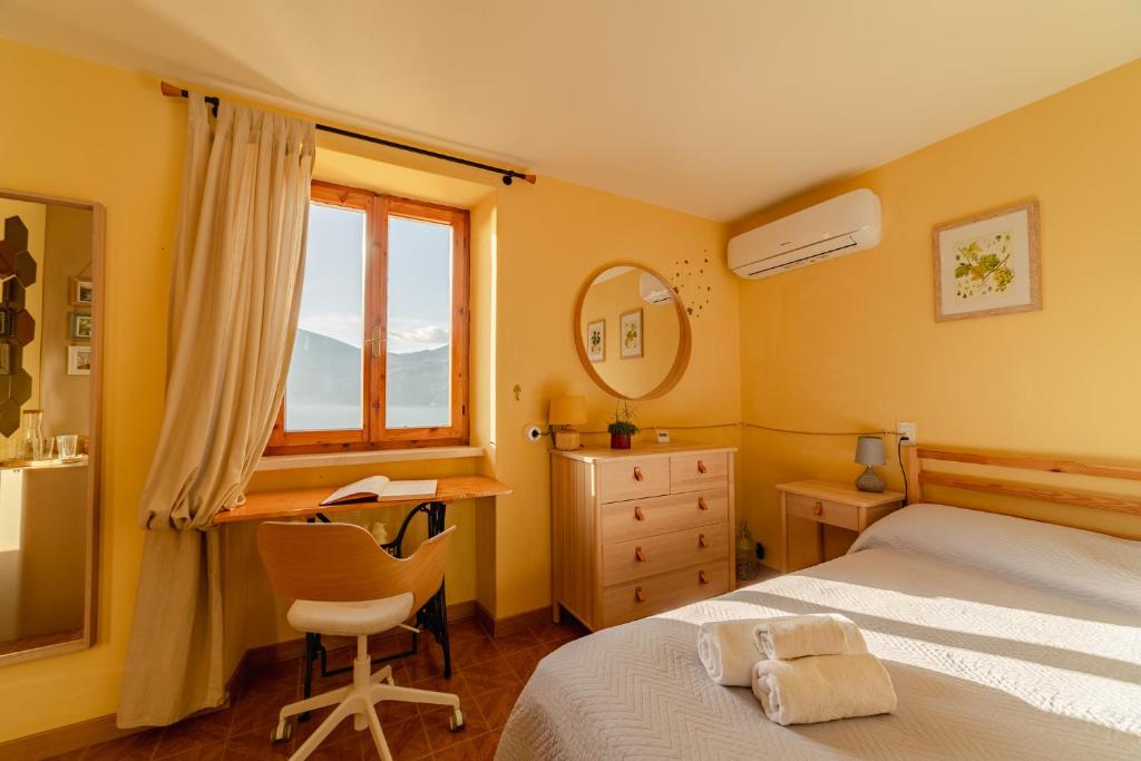 Postel nebo postele na pokoji v ubytování Garda Doma