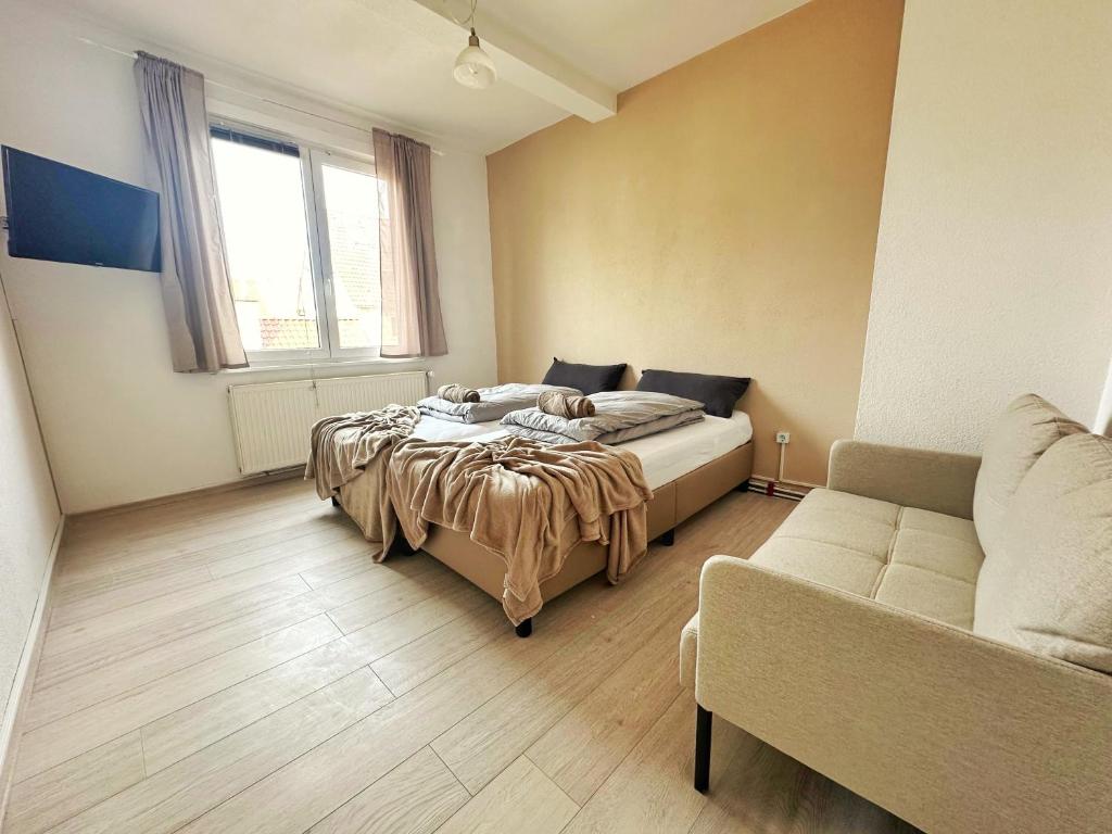 Postel nebo postele na pokoji v ubytování 2 Bed Flat - Sleeps 4 - Pets - Parking - Wifi