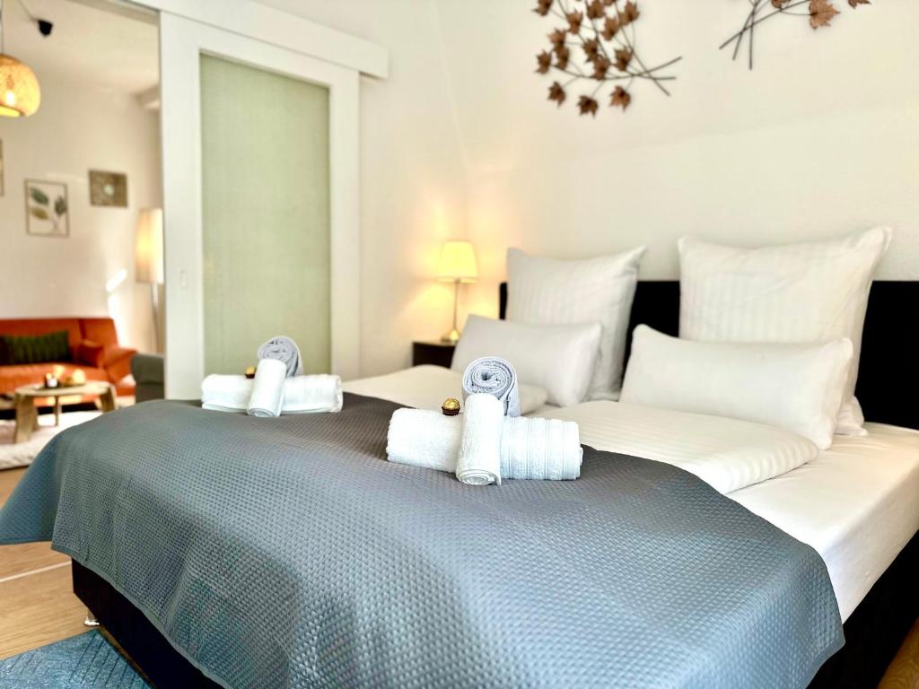 Ein Bett oder Betten in einem Zimmer der Unterkunft Boutique Apartment • Zentrum • Netflix • Parkplatz