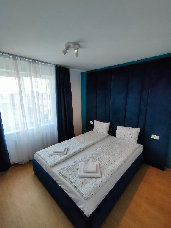 Postel nebo postele na pokoji v ubytování Fanea Residence