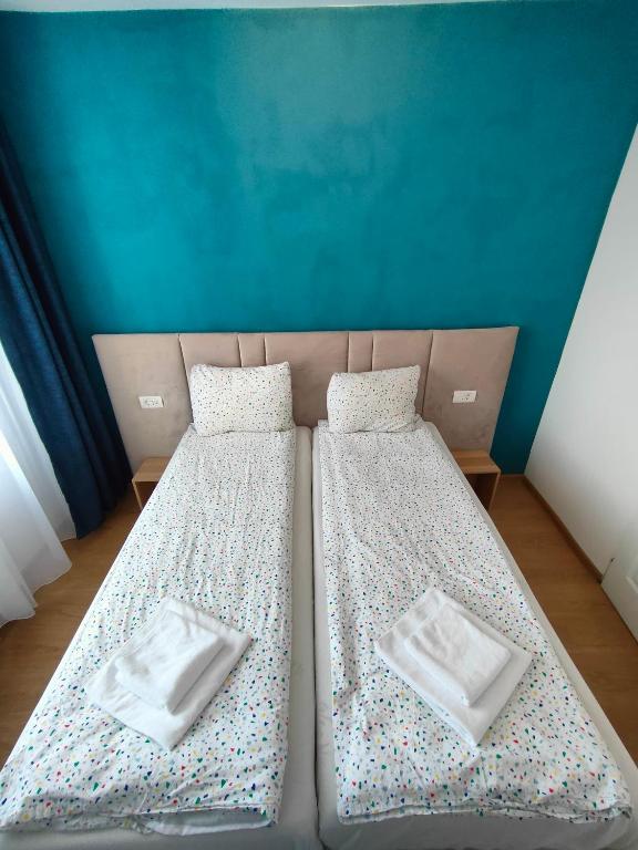 Postel nebo postele na pokoji v ubytování Fanea Residence