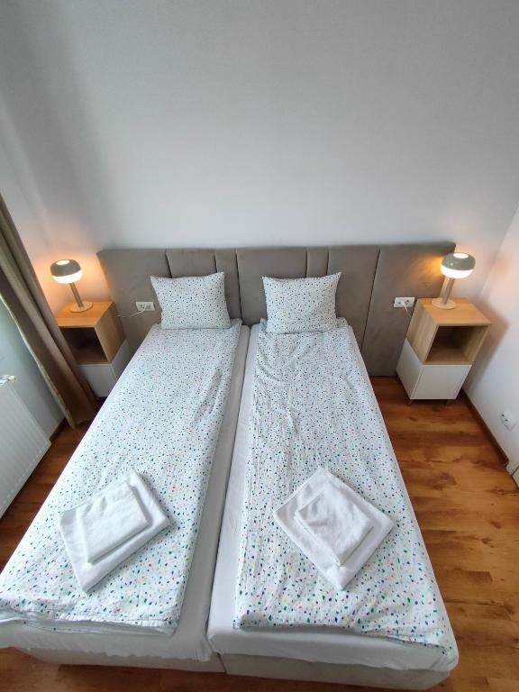 Postel nebo postele na pokoji v ubytování Fanea Residence