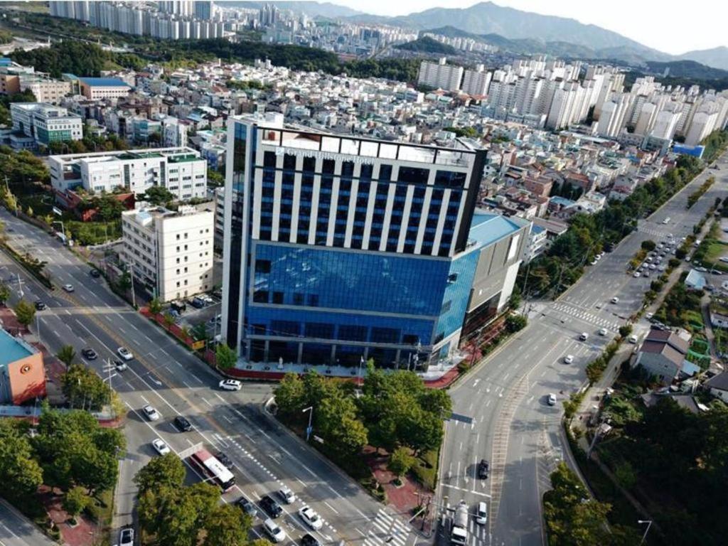 an aerial view of a large building in a city at Grand Hillstone in Jeonju