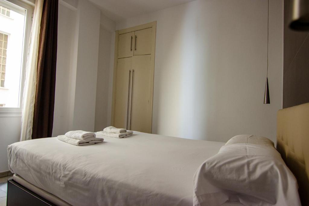 A bed or beds in a room at Apartamento amplio y luminoso a 2 min del Centro
