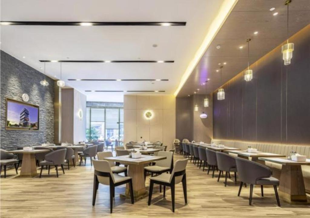 ห้องอาหารหรือที่รับประทานอาหารของ Premier City Comfort Hotel Quanzhou Wanda Plaza