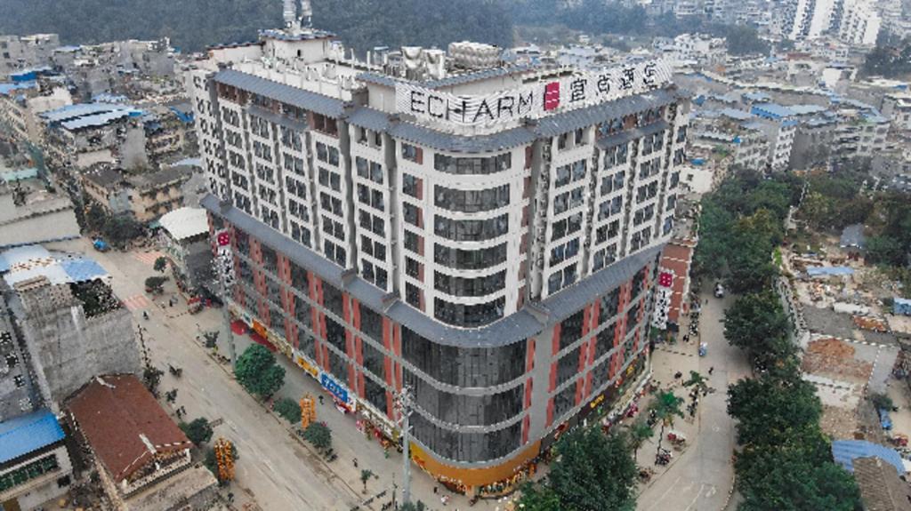 an overhead view of a large building in a city at Echarm Hotel Baise Xilin 