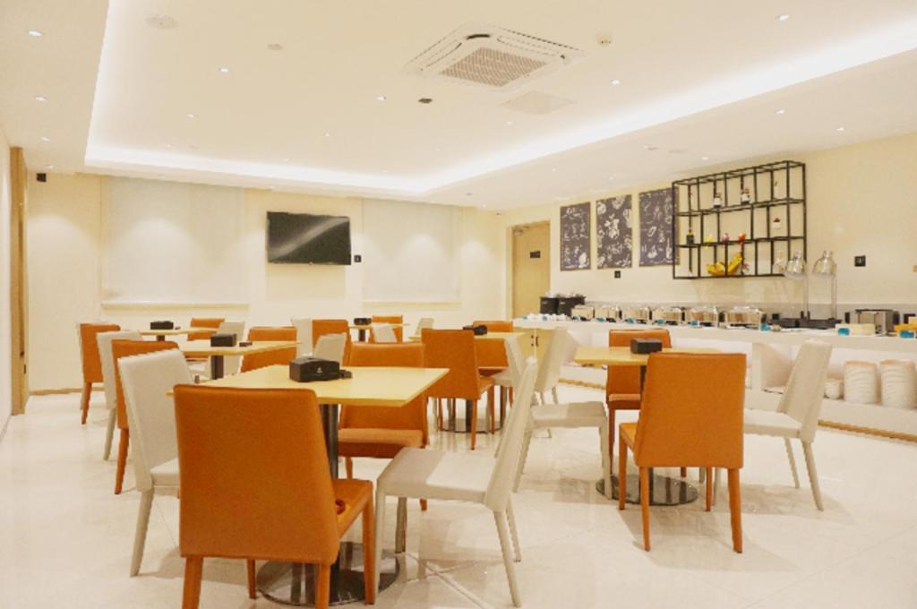 ห้องอาหารหรือที่รับประทานอาหารของ City Comfort Inn Zhanjiang International Trade Dingsheng Plaza