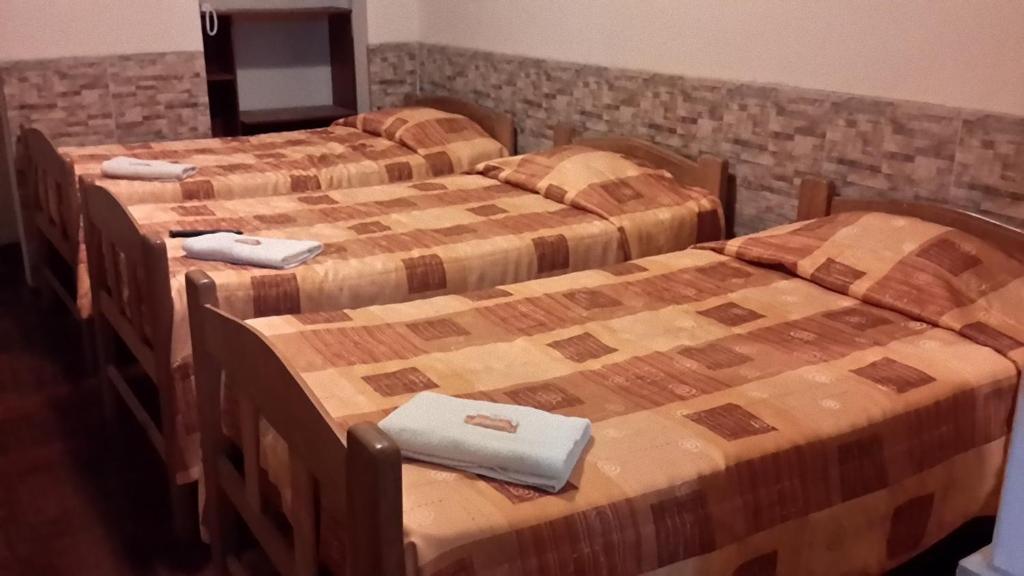 Postel nebo postele na pokoji v ubytování Hotel Pradera Verde Inn