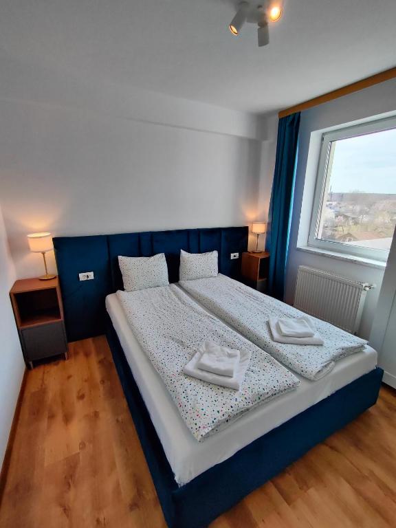 Postel nebo postele na pokoji v ubytování Fanea Residence