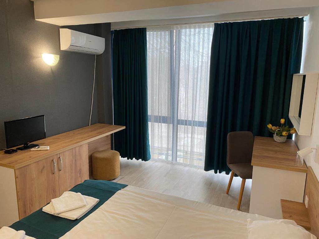 TV a/nebo společenská místnost v ubytování Hotel Fors