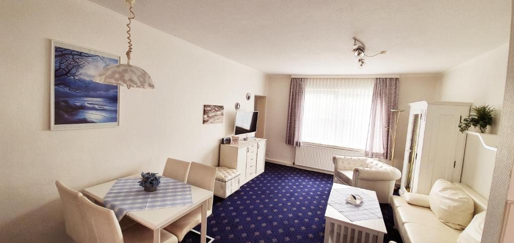 Posezení v ubytování Hotel-Pension Haus Hubertus