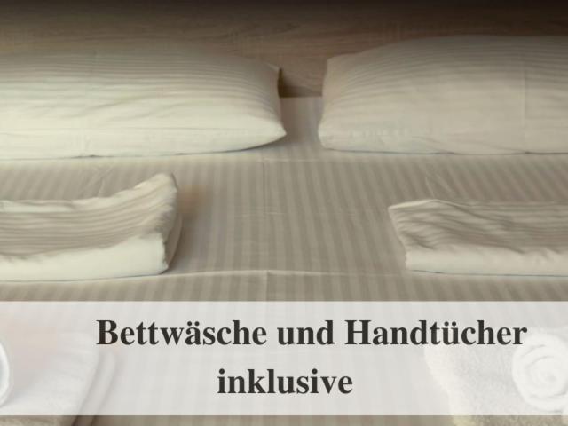 Postel nebo postele na pokoji v ubytování Waldstrandnest mit Weitblick