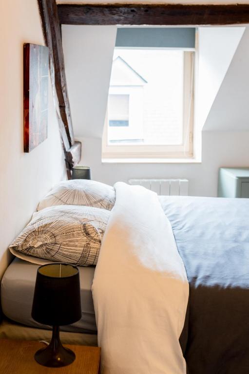 Posteľ alebo postele v izbe v ubytovaní Le duplex de Lise