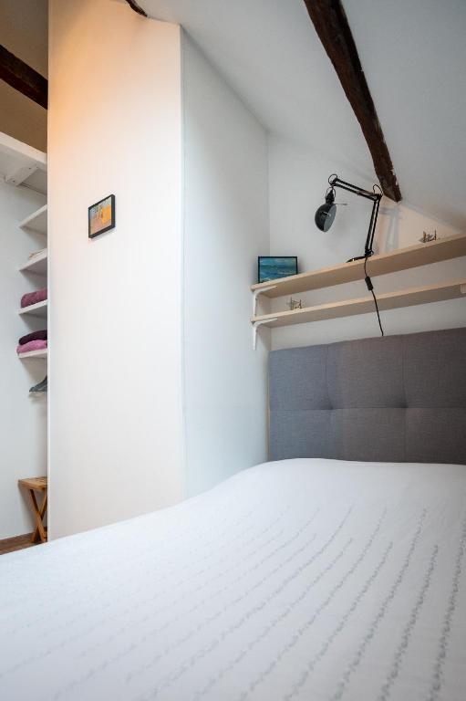 Posteľ alebo postele v izbe v ubytovaní Le duplex de Lise