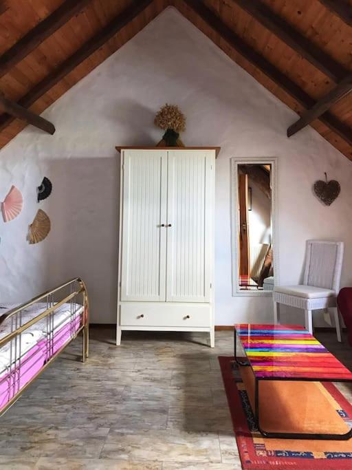 Postel nebo postele na pokoji v ubytování Obergeschosswohnung mit Ausblick
