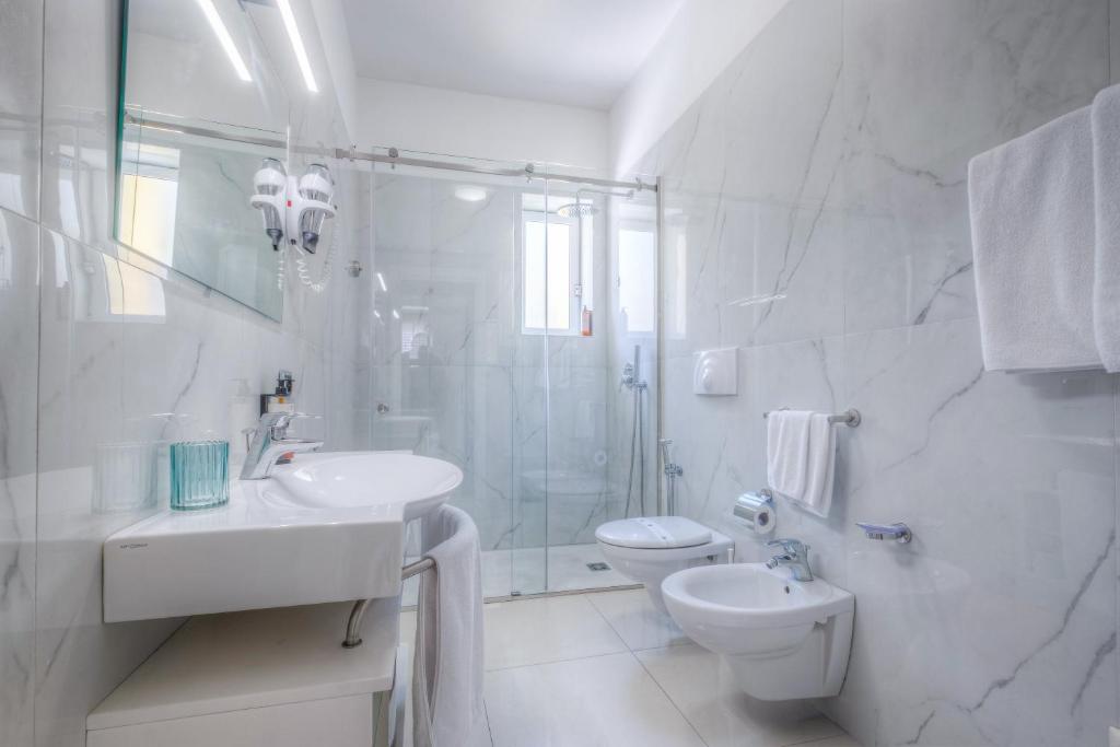 Koupelna v ubytování Victoria Palace Hotel & Zen Wellness