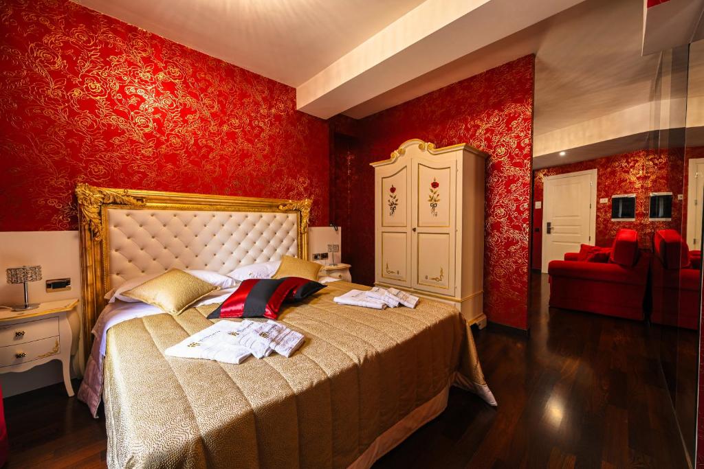 Postel nebo postele na pokoji v ubytování Hotel Mastrodattia