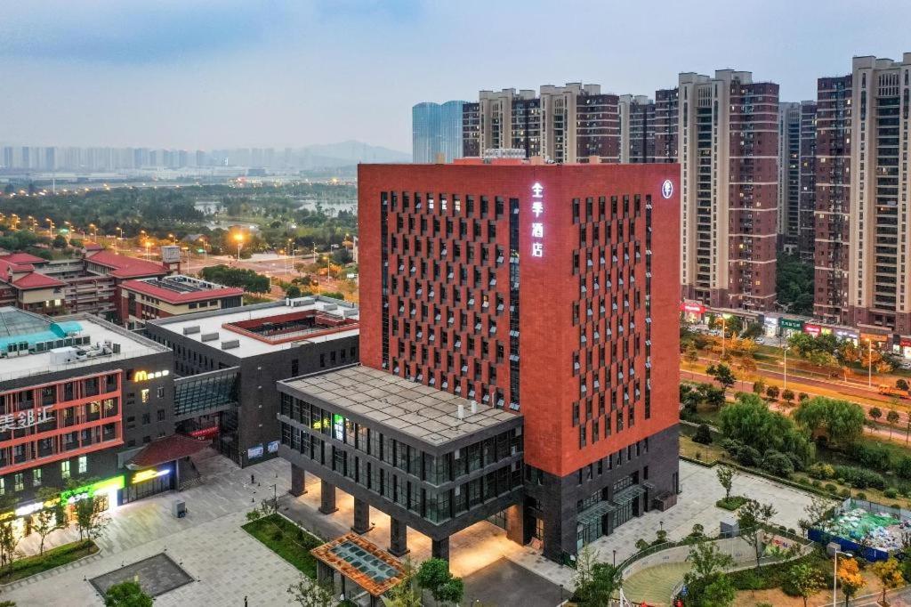 an overhead view of a building in a city at Ji Hotel Nanjing Xianlin Wandamao in Dongchanglin