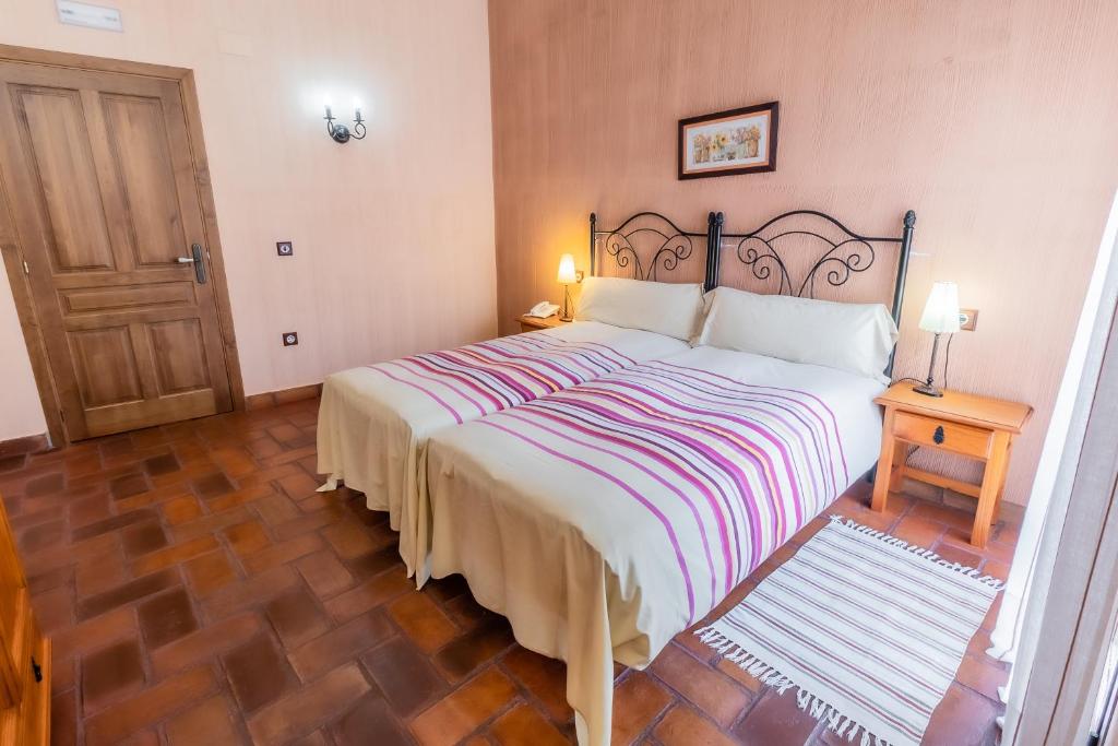 Posteľ alebo postele v izbe v ubytovaní Hotel Rural La Sinforosa