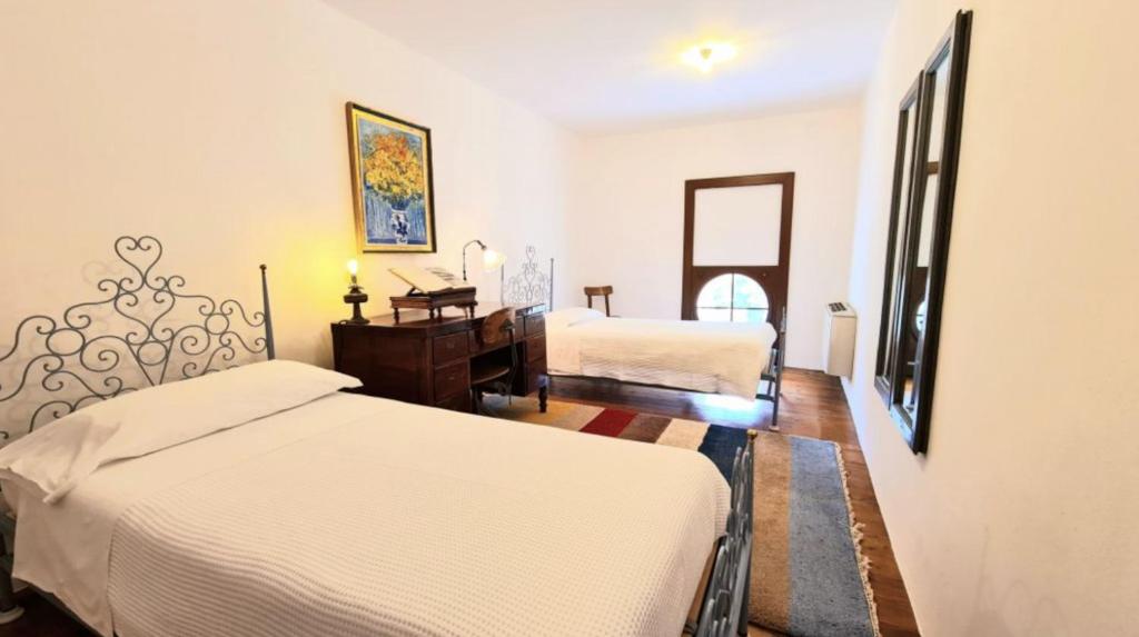 Postel nebo postele na pokoji v ubytování Castello di Lispida
