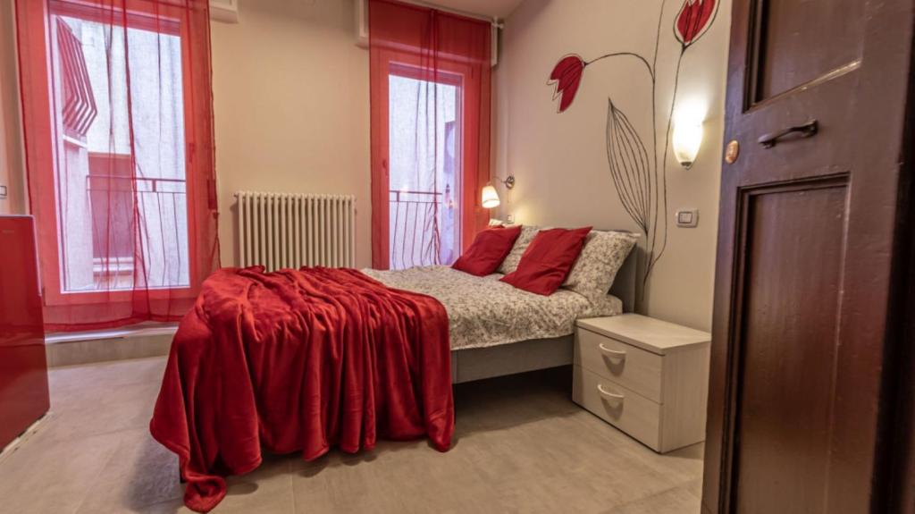 Кровать или кровати в номере Suite Modena al Centro - Affitti Brevi Italia