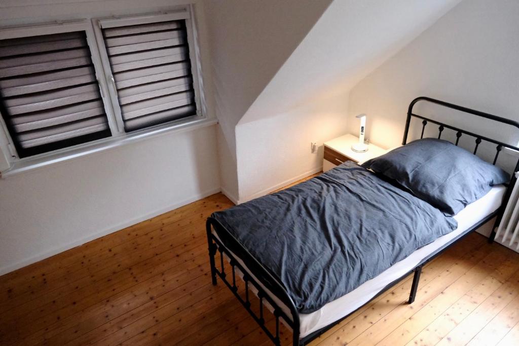 Ένα ή περισσότερα κρεβάτια σε δωμάτιο στο Haus für Monteure und Reisende