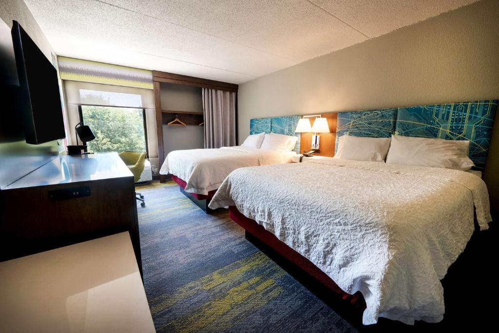 Postel nebo postele na pokoji v ubytování Hampton Inn Flemington