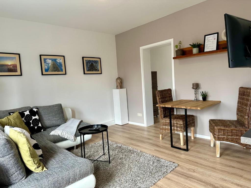 TV a/nebo společenská místnost v ubytování Gästeapartement Markkleeberg