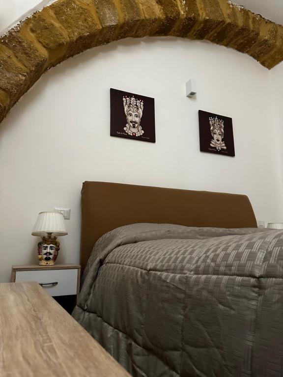 Postel nebo postele na pokoji v ubytování O munti rooms
